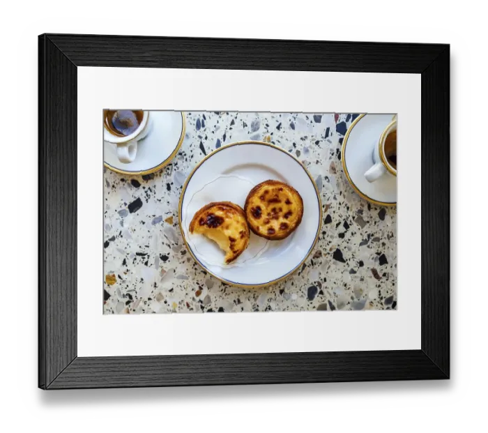 Framed Print : Delicious portuguese pastry named pastel de Belem or pastel de nata typically eaten with expresso coffee