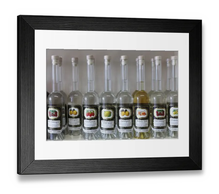 Framed Print : Bottles of spirits and brandy, Fraenkische Edelbrennerei Theiler distillery