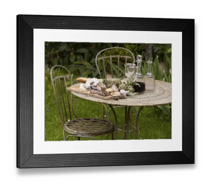Framed Print : Mediterranean still life of a garden table covered with regional produce