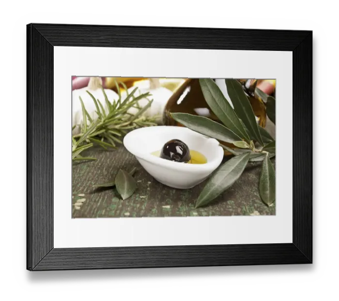 Framed Print : An olive with a bottle of olive oil