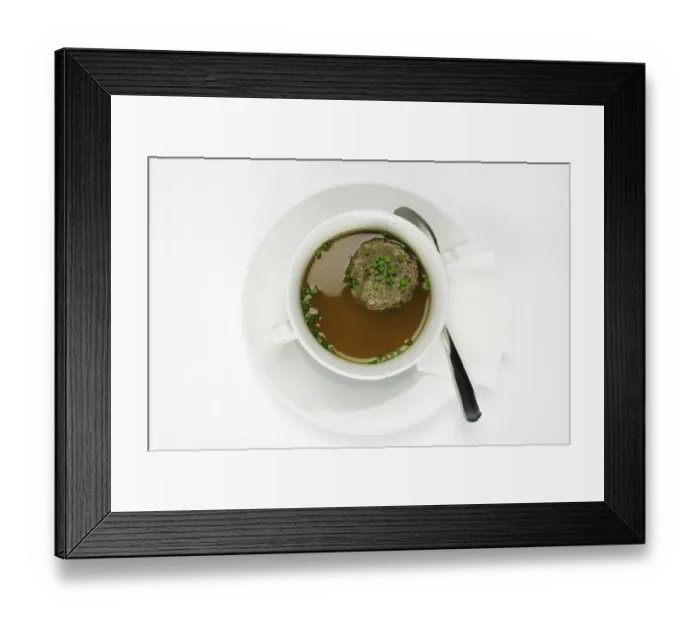 Framed Print : Liver dumplings in beef broth, sprinkled with chives