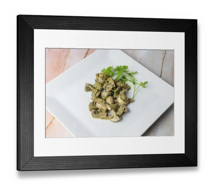 Framed Print : Herb-marinated mushrooms with parsley on a square white plate
