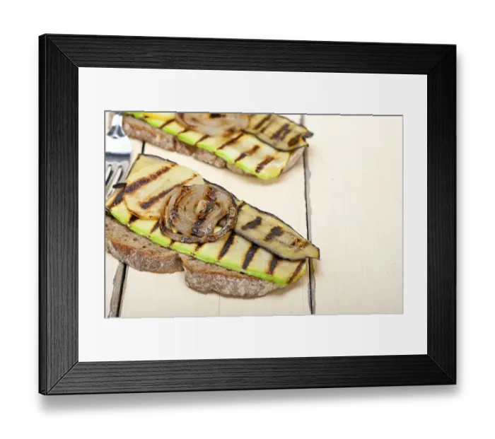 Framed Print : Grilled vegetables on rustic bread over wood table Framed Print : Grilled vegetables on rustic bread over wood table