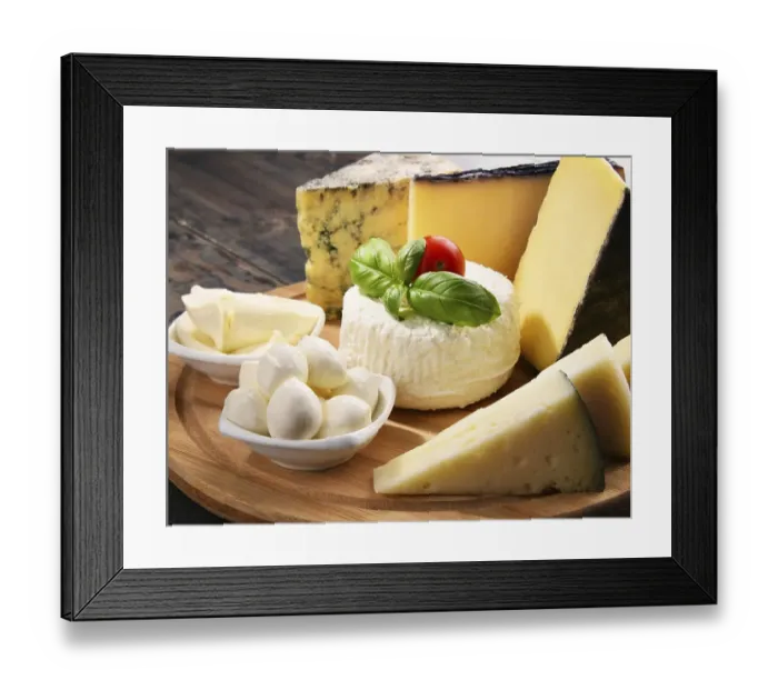 Framed Print : Different sorts of cheese on kitchen table Framed Print : Different sorts of cheese on kitchen table
