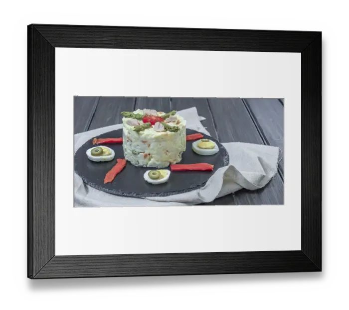 Framed Print : Black slate plate with ensaladilla rusa or Russian salad typical spanish tapa garnished with red bell pepper