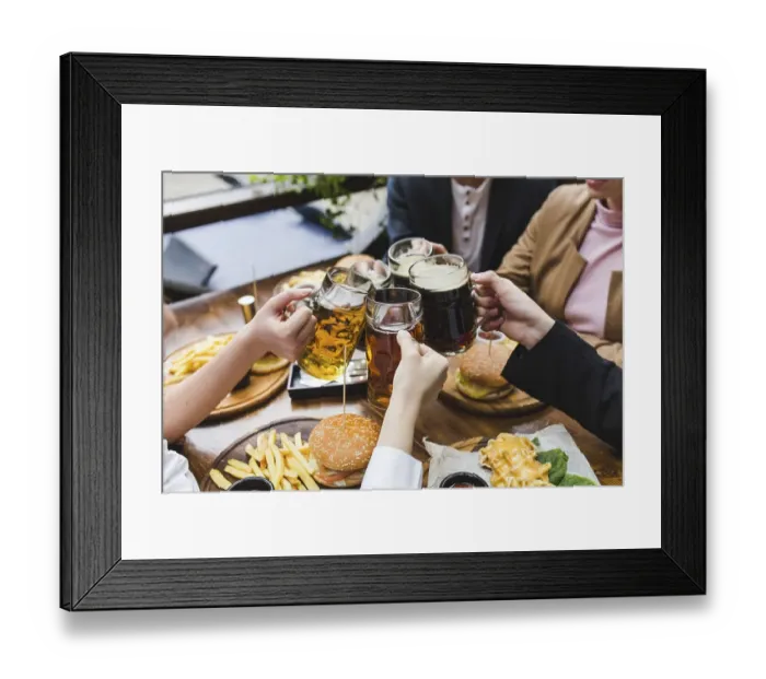 Framed Print : Friends toasting with beer restaurant