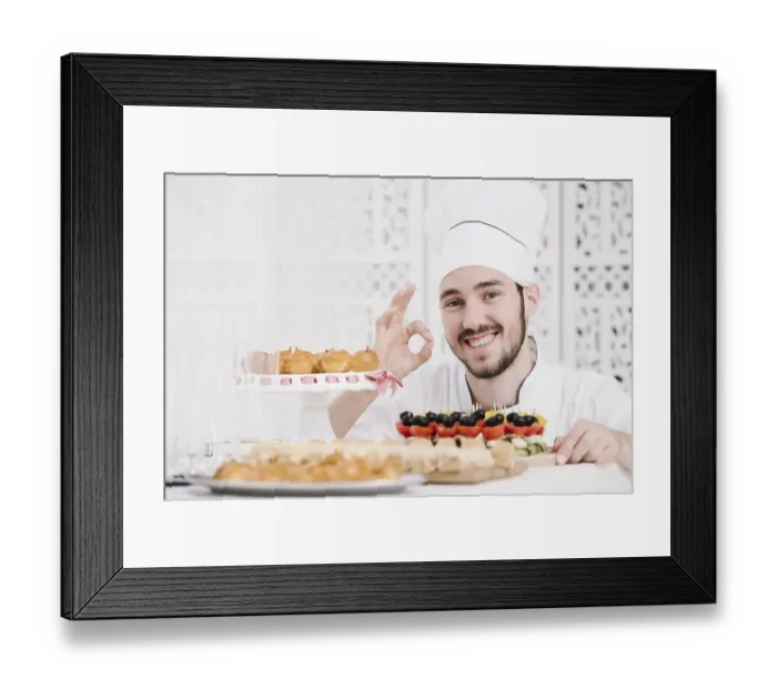 Framed Print : Happy chef presenting food table