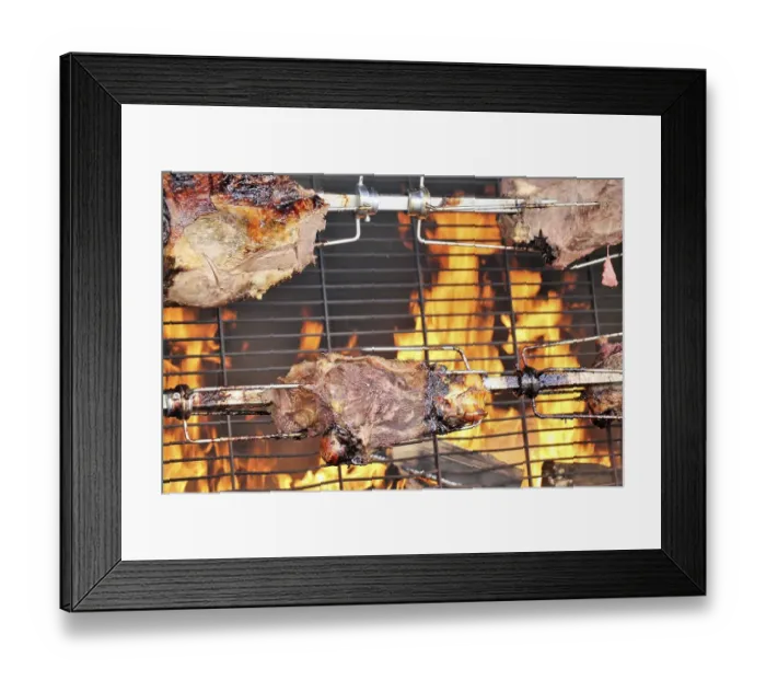 Framed Print : Suckling pig leg on the spit