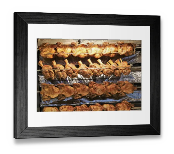 Framed Print : Grilled knuckle of pork and chicken on the spit