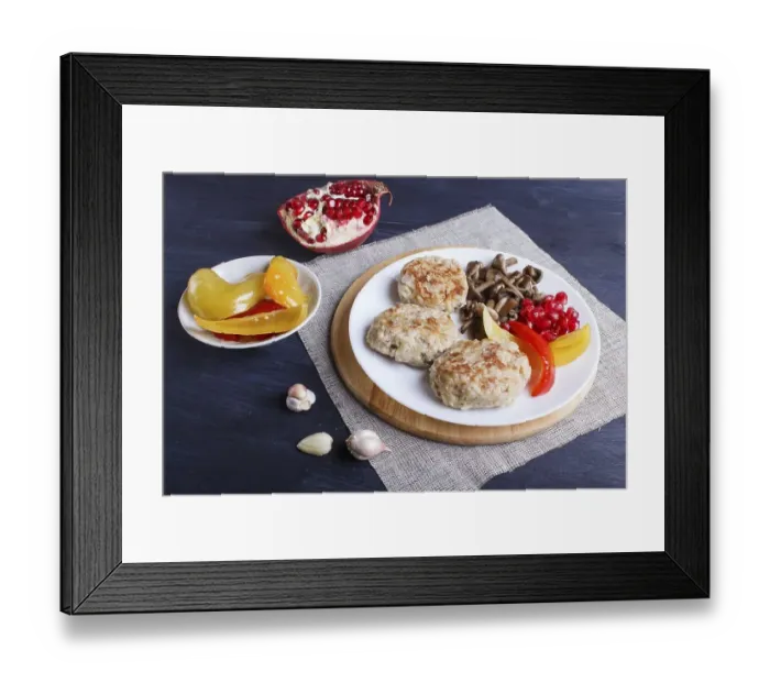 Framed Print : Meatballs with rice mushrooms, sweet peppers and pomegranate seeds on black wooden background