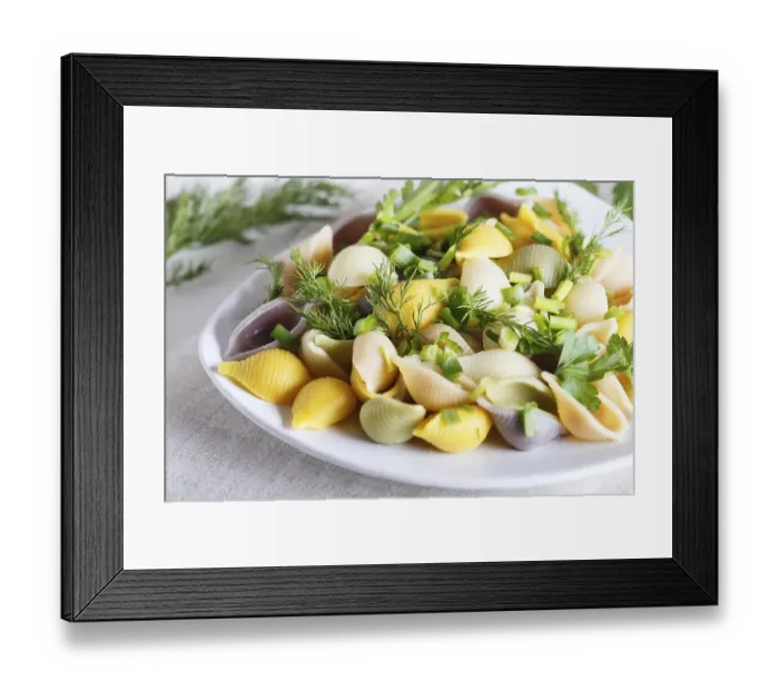 Framed Print : Conchiglie colored pasta with fresh greengrocery on a linen tablecloth on white wooden background