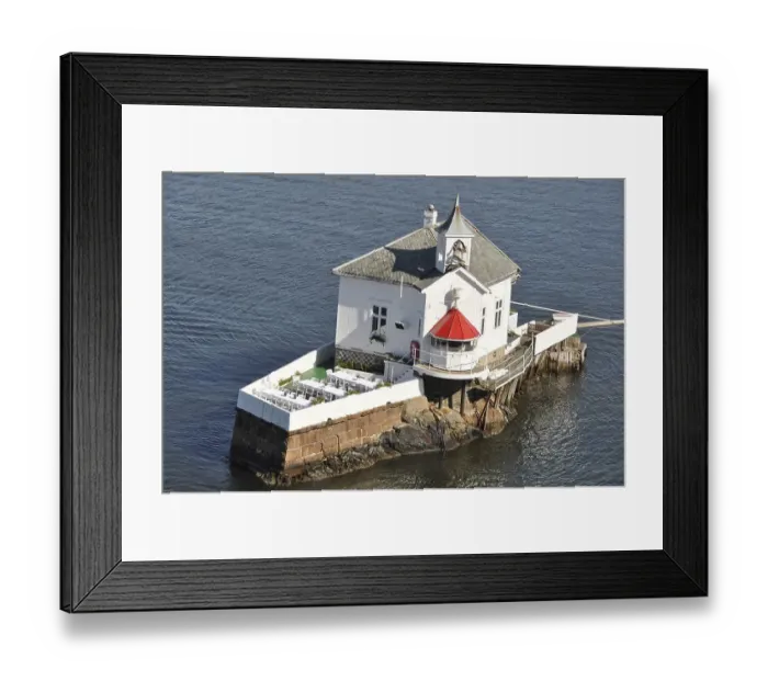 Framed Print : Small lighthouse, now used as a restaurant