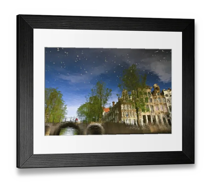 Framed Print : Reflection of buildings in a canal in Amsterdam