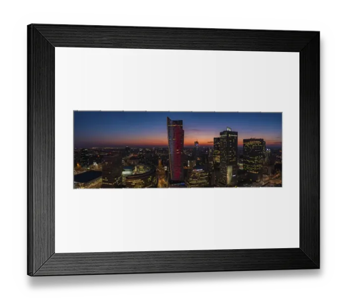 Framed Print : A panorama picture of the sun setting over Warsaw's business center and skyscrapers