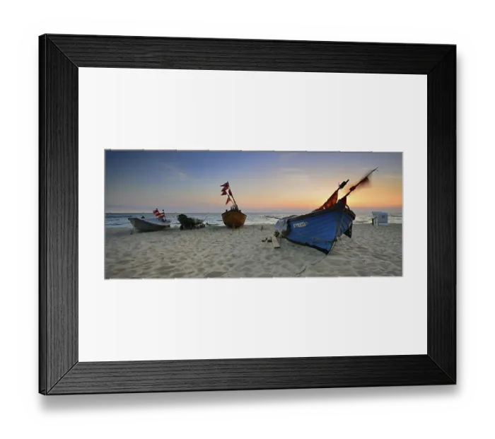 Framed Print : Fishing boats on beach at sunrise