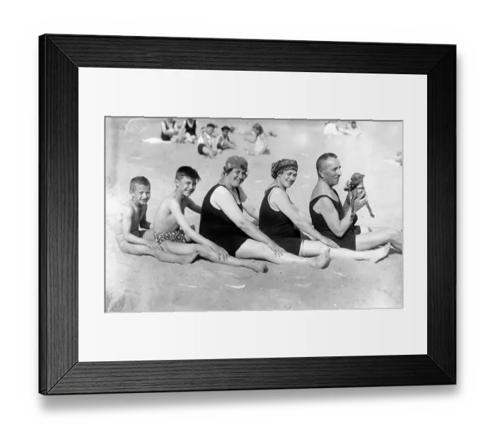 Framed Print : Family on the beach with dog ca Framed Print : Family on the beach with dog ca