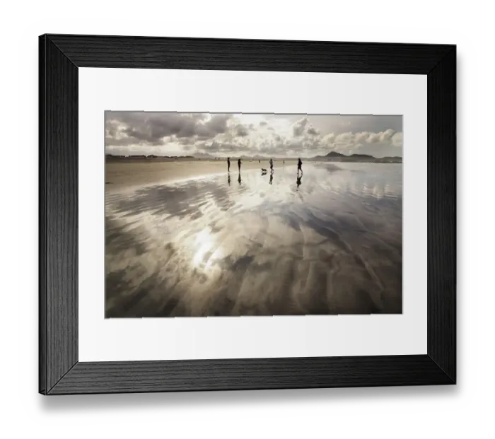 Framed Print : People walking along Famara Beach