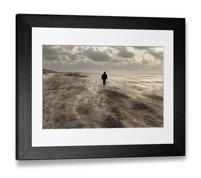 Framed Print : Lone figure of a person on a windy beach Framed Print : Lone figure of a person on a windy beach