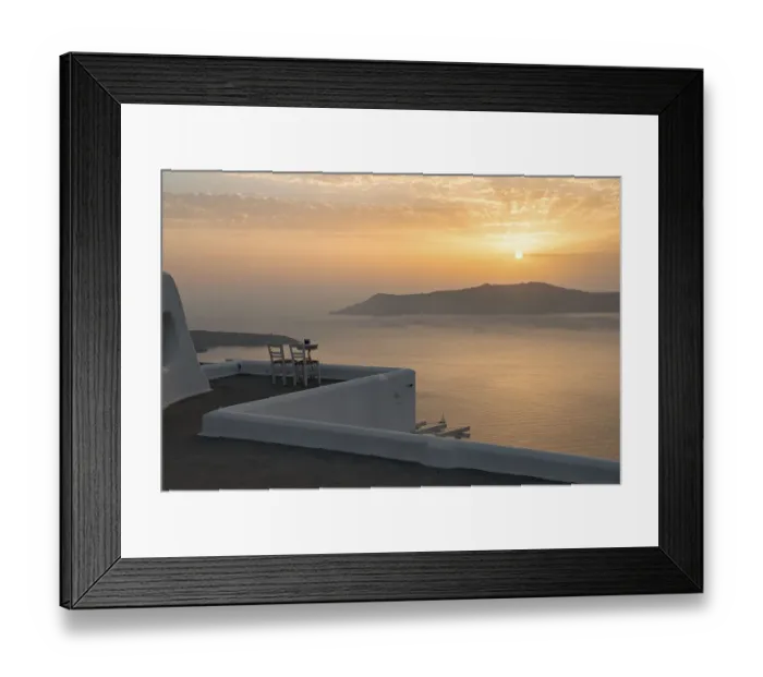 Framed Print : Two chairs on terrace, sunset, view of ocean