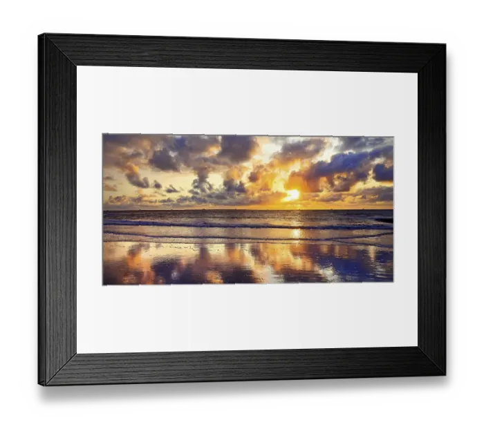 Framed Print : The sky with colourful clouds reflected in the mudflat landscape at sunset