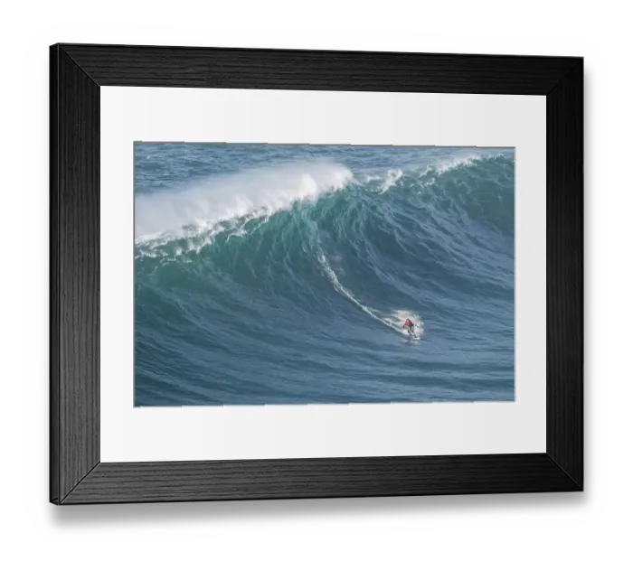Framed Print : A surfer rides a crashing wave Framed Print : A surfer rides a crashing wave