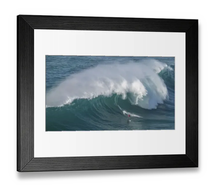Framed Print : A surfer rides a crashing wave Framed Print : A surfer rides a crashing wave