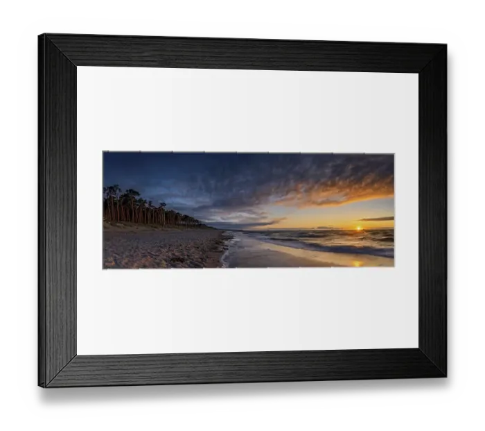 Framed Print : Sunset on the west beach near Prerow with illuminated trees as a long exposure