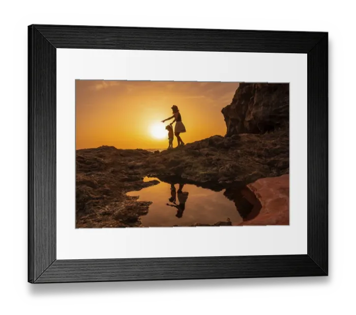 Framed Print : Silhouette of mother and son walking in the sunset on the beach of Tacoron in El Hierro Framed Print : Silhouette of mother and son walking in the sunset on the beach of Tacoron in El Hierro