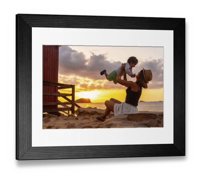 Framed Print : Mother having fun with her son at sunset in Cala Comte beach on the island of Ibiza Framed Print : Mother having fun with her son at sunset in Cala Comte beach on the island of Ibiza
