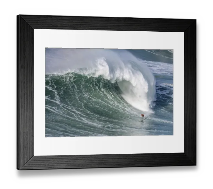Framed Print : A surfer rides a crashing wave Framed Print : A surfer rides a crashing wave