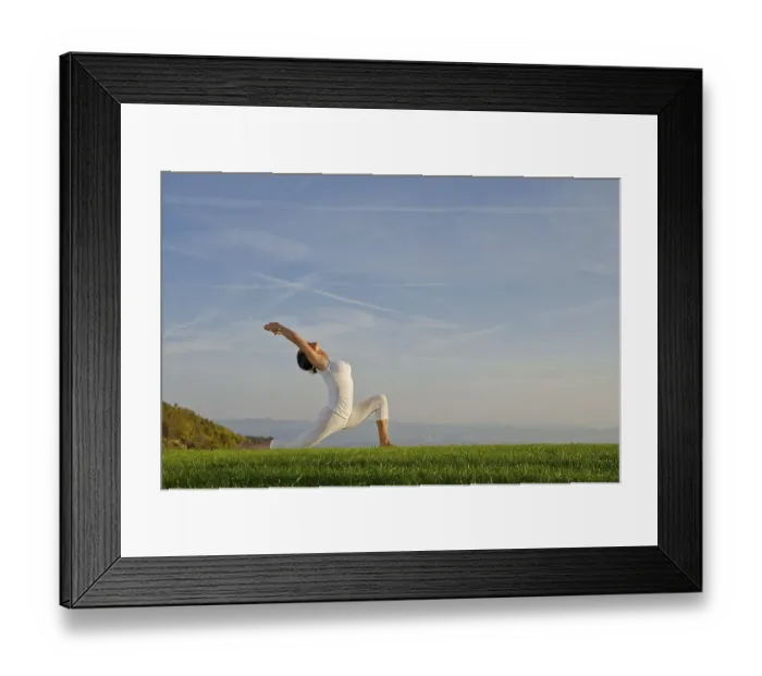 Framed Print : Young woman practising Hatha yoga outdoors Framed Print : Young woman practising Hatha yoga outdoors