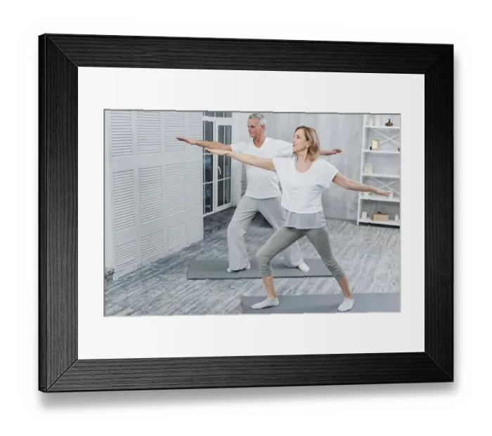 Framed Print : Healthy couple performing exercising yoga mat home