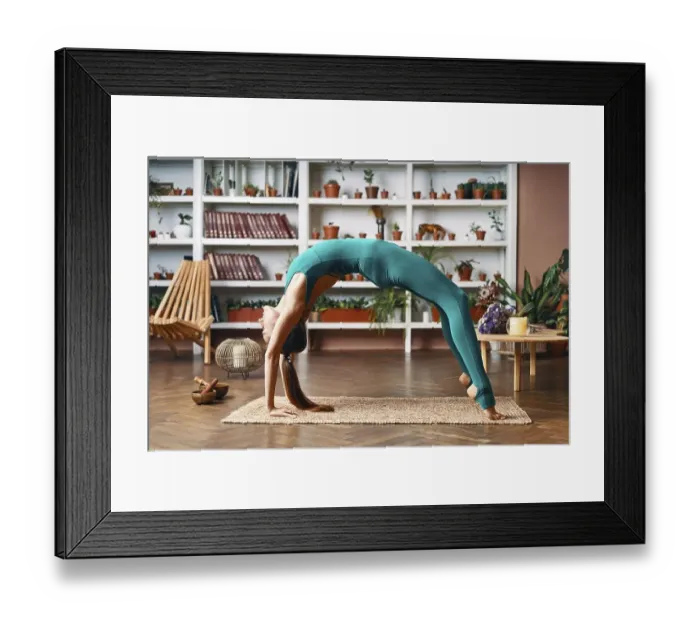Framed Print : Young woman practicing yoga doing bridge pose Framed Print : Young woman practicing yoga doing bridge pose