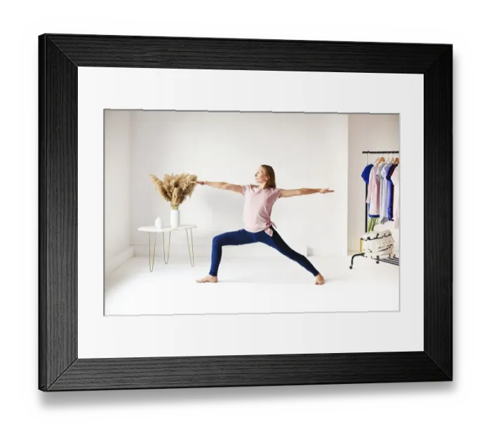 Framed Print : Calm female in sportswear practicing yoga in pose while balancing and looking away