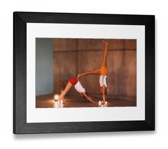 Framed Print : Two young slender women in colorful sportive wears doing yoga for relax Framed Print : Two young slender women in colorful sportive wears doing yoga for relax