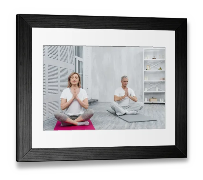 Framed Print : Senior couple meditating with praying hands yoga mat home Framed Print : Senior couple meditating with praying hands yoga mat home