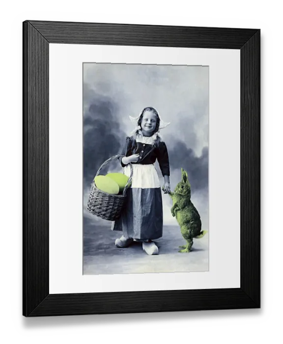 Framed Print : Little dutchwoman with hare and basket with giant eggs Framed Print : Little dutchwoman with hare and basket with giant eggs