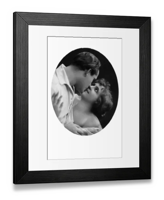 Framed Print : Man and woman kissing in a tender embrace