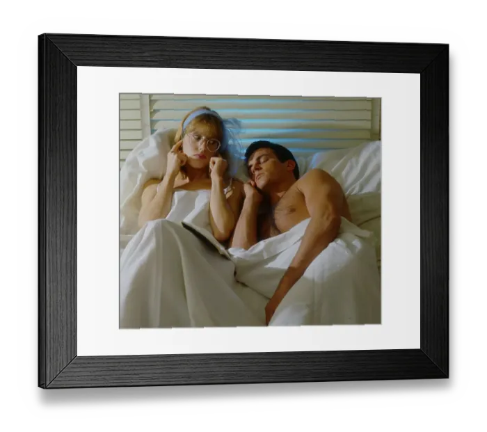 Framed Print : Man and woman in bed Woman covers her ears