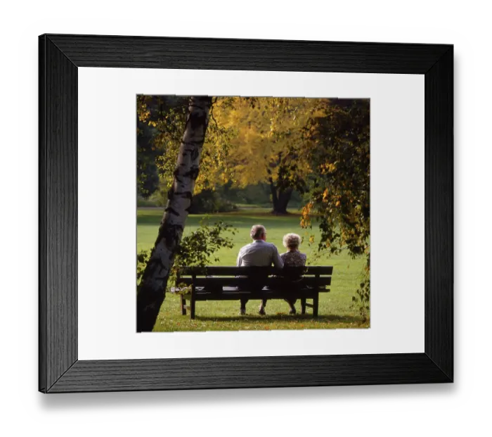 Framed Print : Old couple on the park bench autumn mood