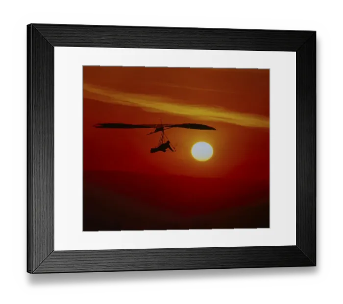 Framed Print : Hang glider in the sunlight