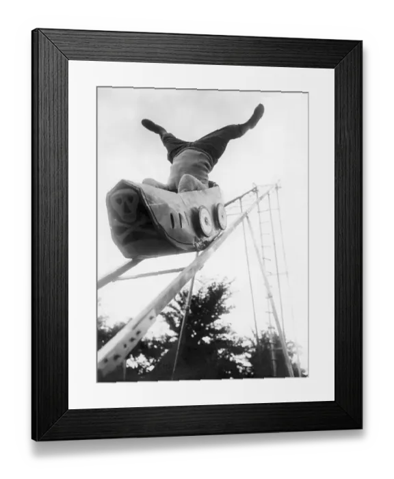 Framed Print : Headstand on roller coaster, ca