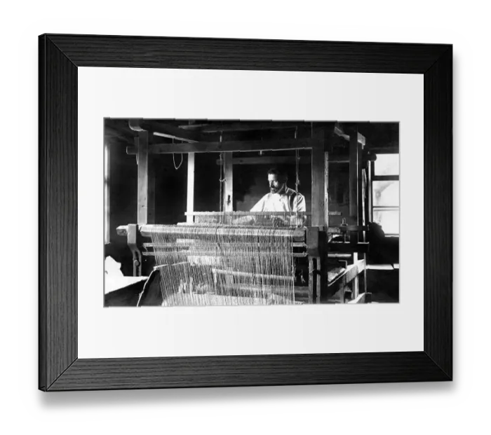 Framed Print : Weaving mill, man at the loom, 1910s