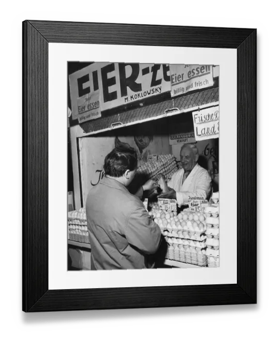 Framed Print : Man buys eggs at market stall, 1960s