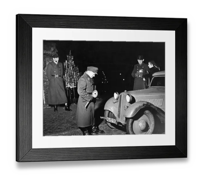 Framed Print : Police officers during a traffic check