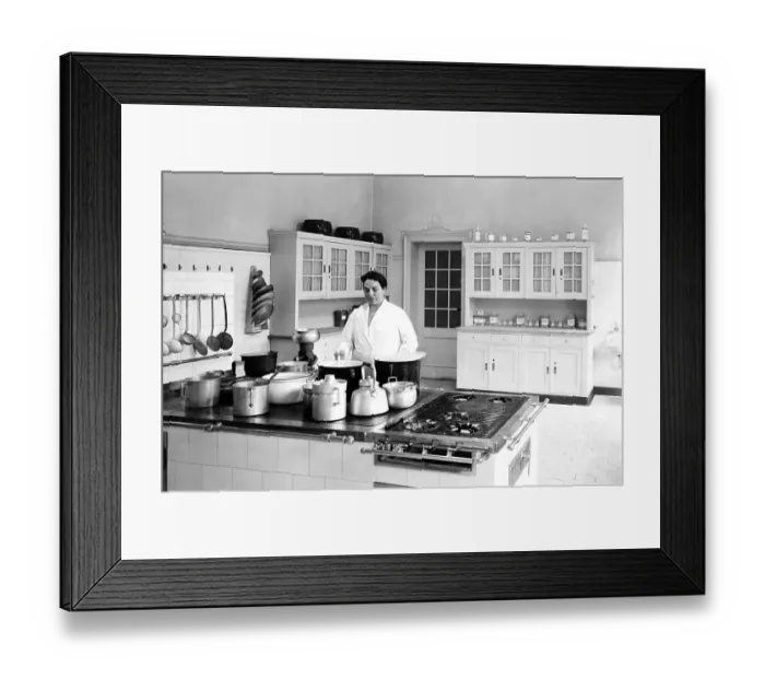 Framed Print : Cook in a large kitchen, ca. 1930s