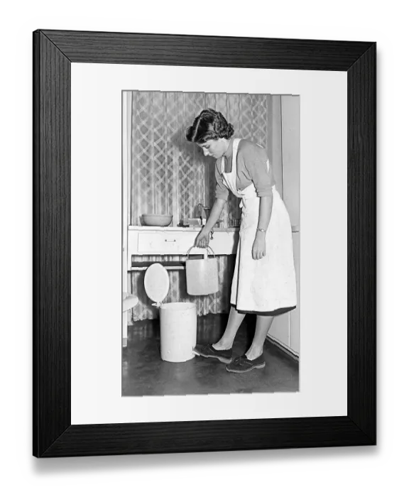 Framed Print : Housewife with trash can, 1960s, Germany, Europe Framed Print : Housewife with trash can, 1960s, Germany, Europe