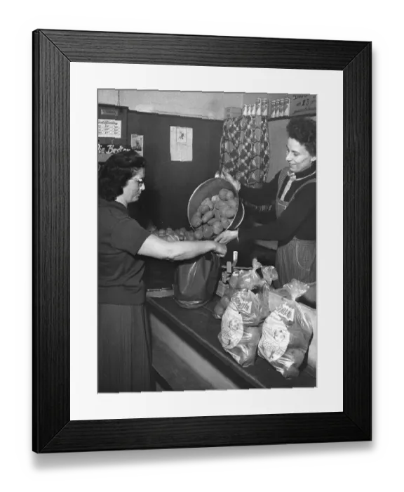 Framed Print : Woman buys potatoes, 1960s, Germany, Europe