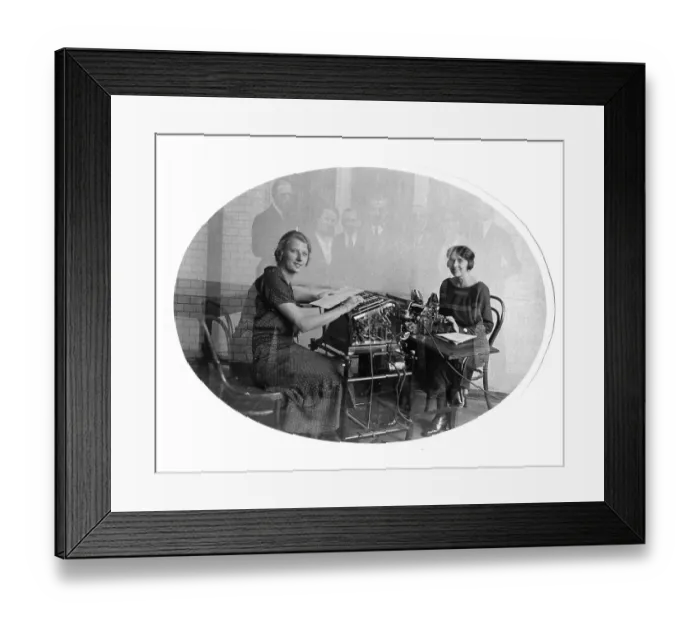 Framed Print : Typewriter, two secretaries at work Framed Print : Typewriter, two secretaries at work