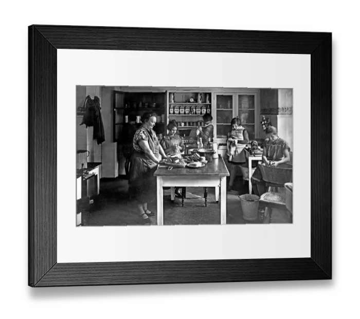 Framed Print : Women and girls working in the kitchen